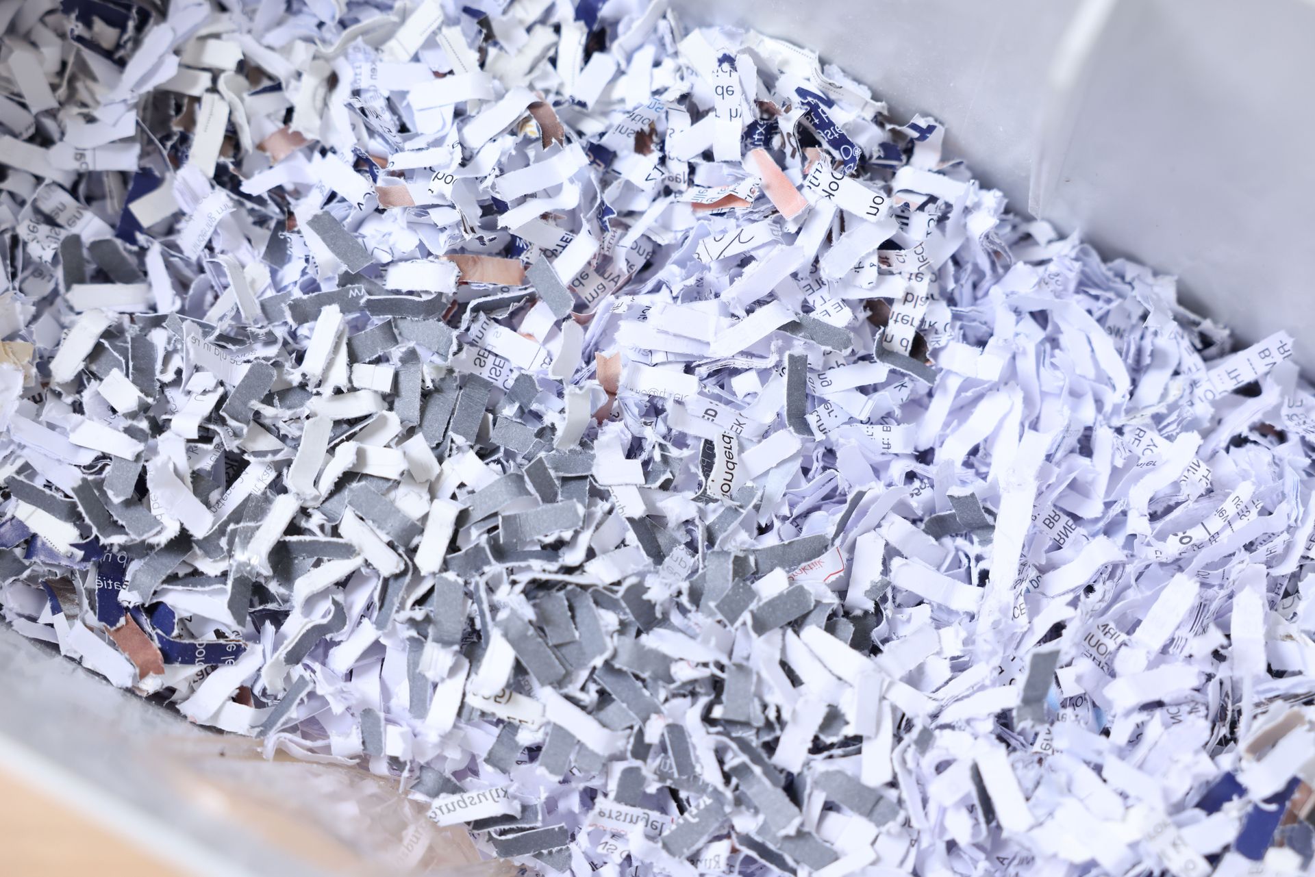 A pile of shredded paper is sitting on a table.