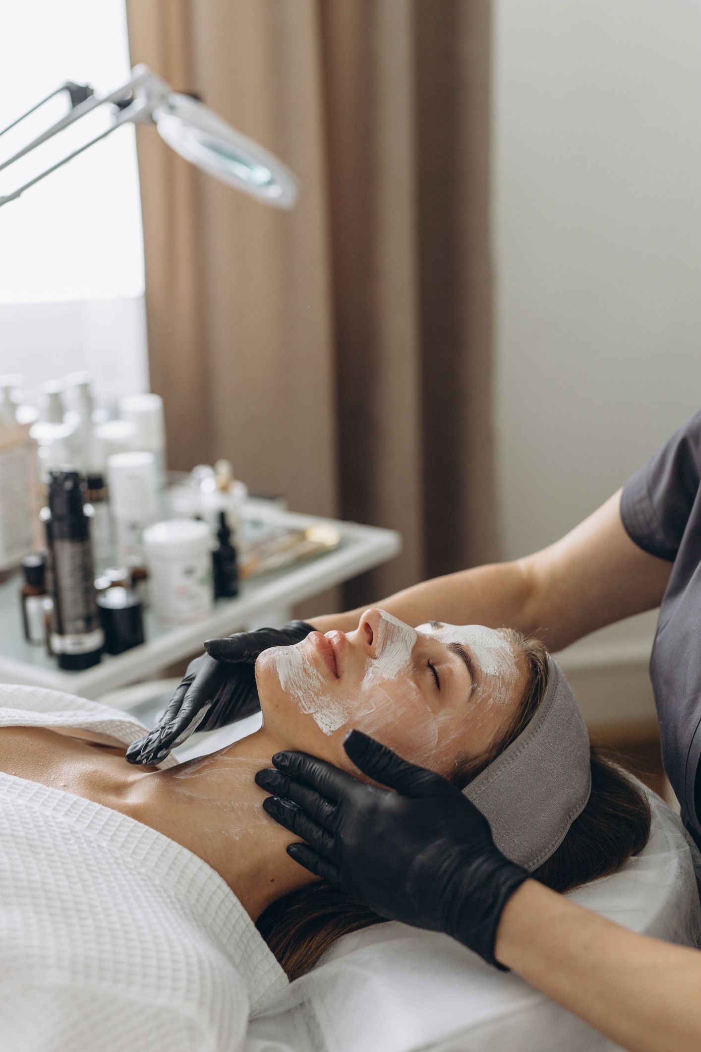 Woman Getting A Facial — Salem, NH — Calithea Revealed