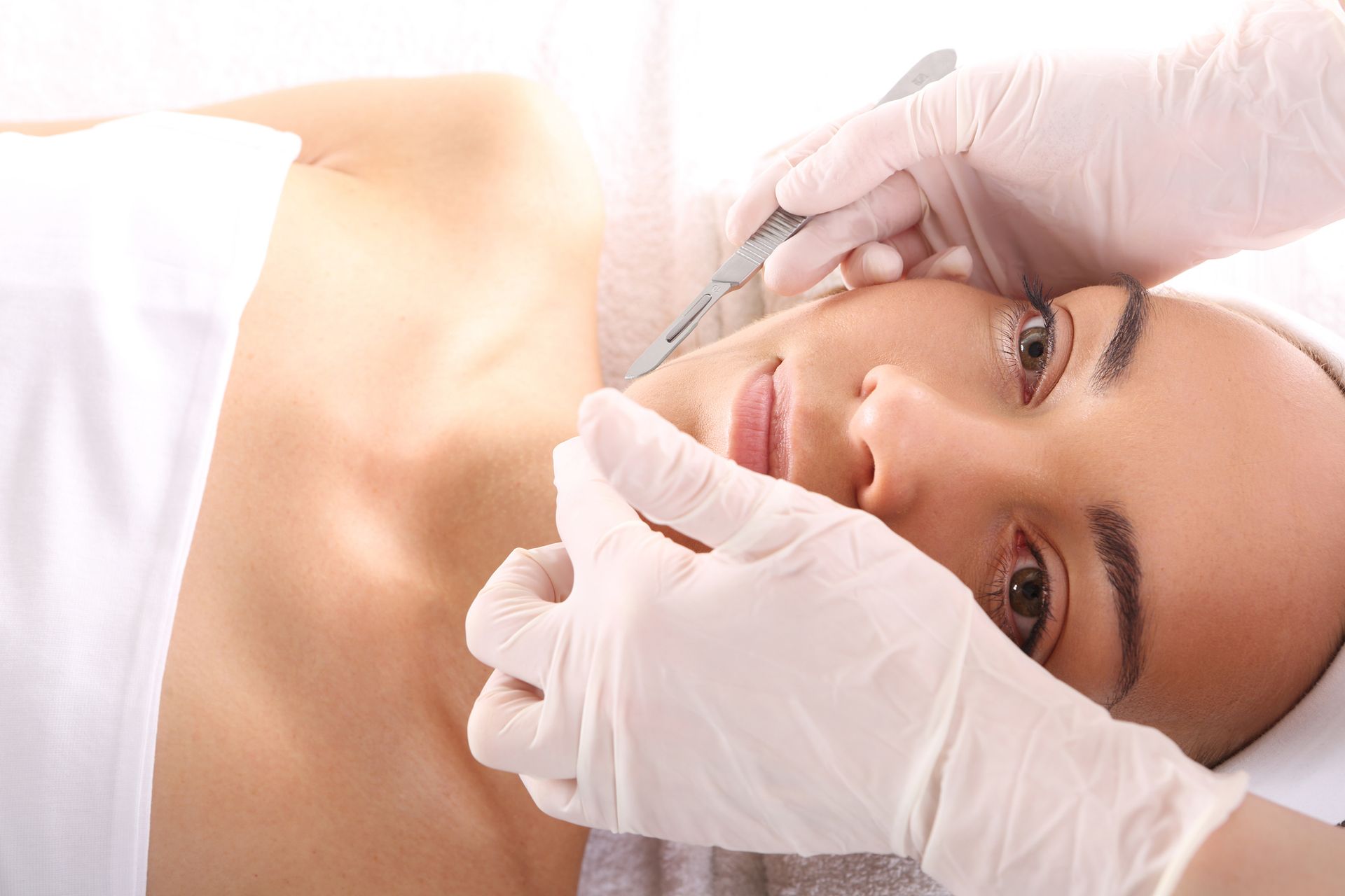 Woman Getting Dermaplaning — Salem, NH — Calithea Revealed