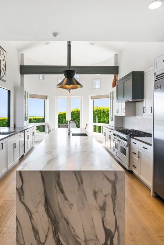 remodeled kitchen with large solid marble island Greenwich, CT