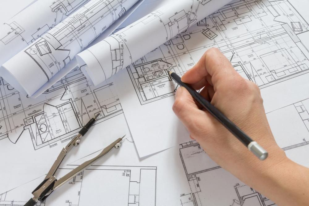 Hand Drawing on Architectural Blueprints — Mid North Coast Drafting & Construction in Taree, NSW