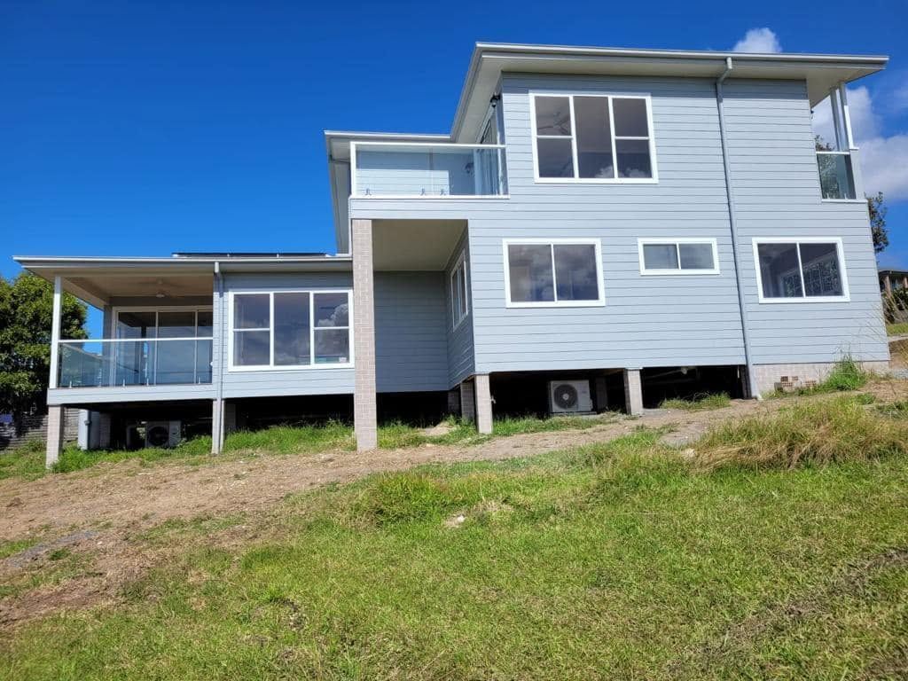 Builder Forster Modern Two-storey Home On A Sloping Block