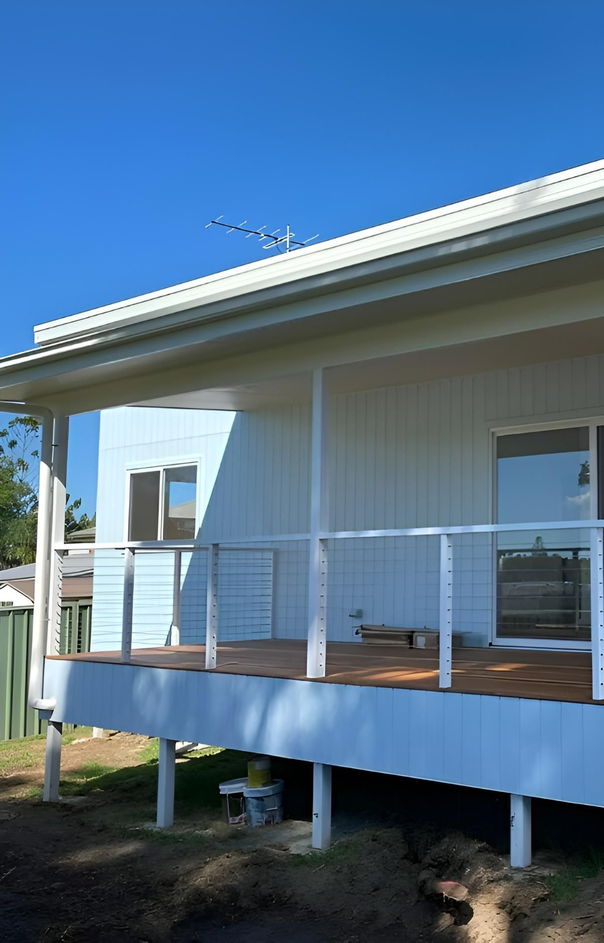Deck With White Railing and Roof — Mid North Coast Drafting & Construction in Harrington, NSW