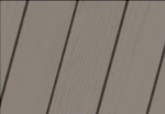 A close up of a grey wooden surface with a diagonal pattern.