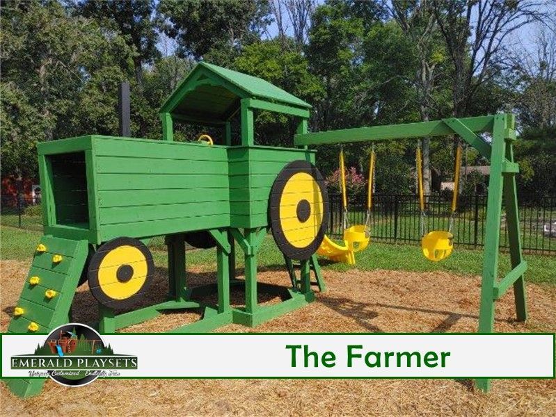 Green wooden playset shaped like a tractor with a yellow swing set.