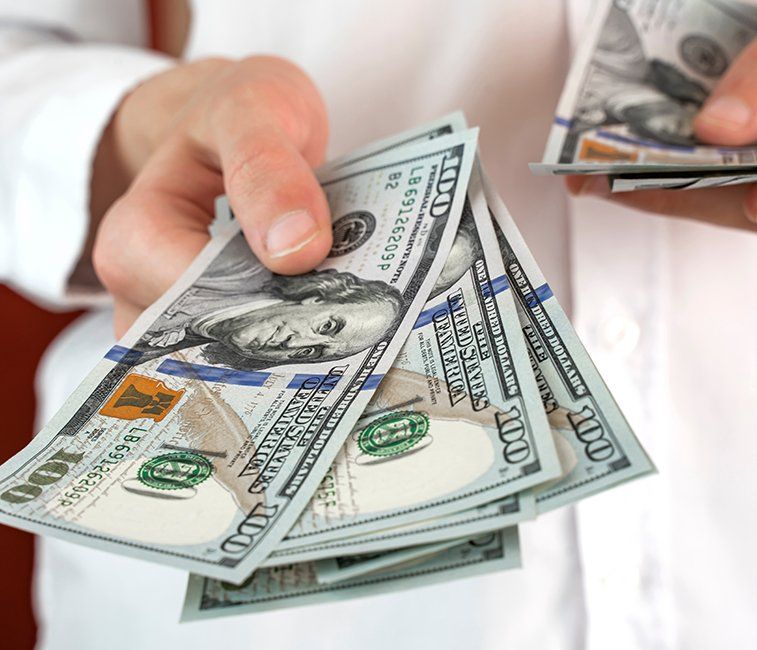 Person handling the money