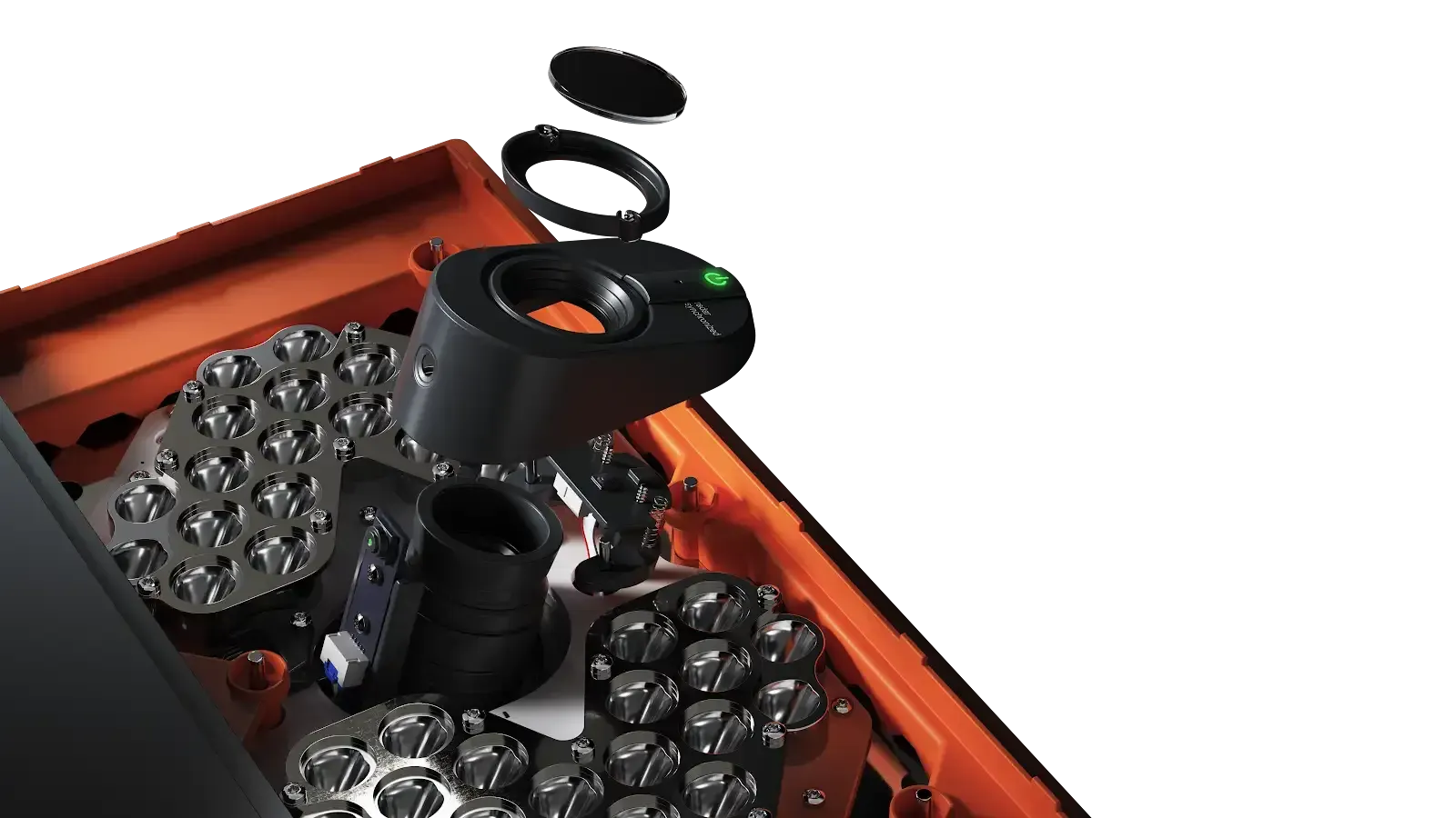 Exploded view of black and gray camera equipment in an orange box, showing lenses, accessories, and a control panel.