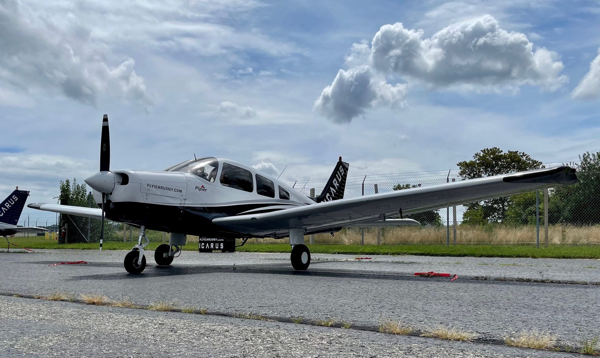 Private Pilot License training in Piper Warrior aircraft at Republic Airport Long Island flying academy