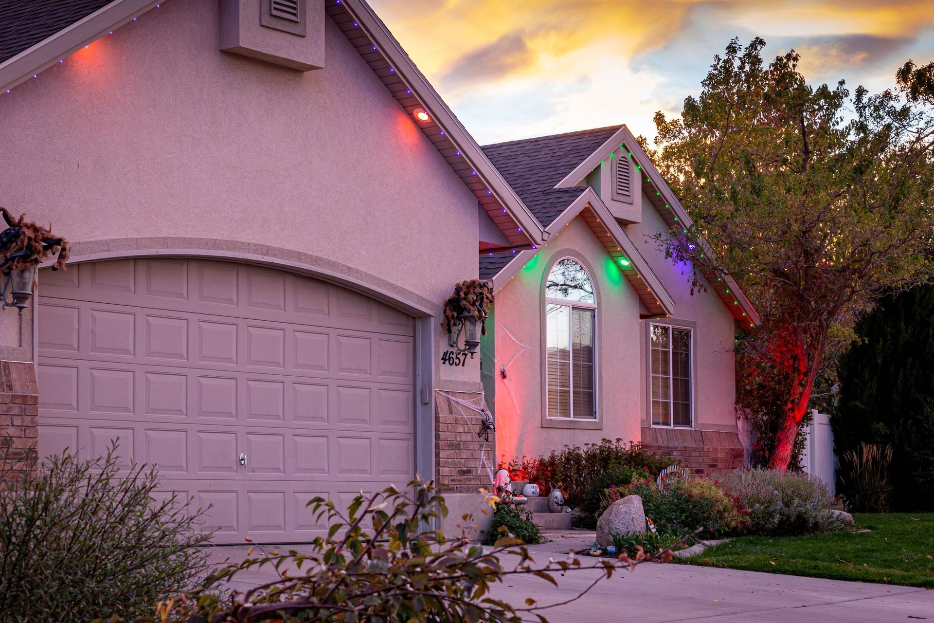 A house with christmas lights on the front of it
