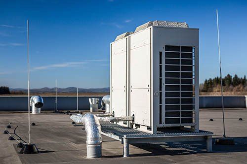 hvac unit on top of commercial building