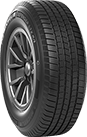 Car tire with a black rubber tread and silver rim. | Joe's Auto and Tire