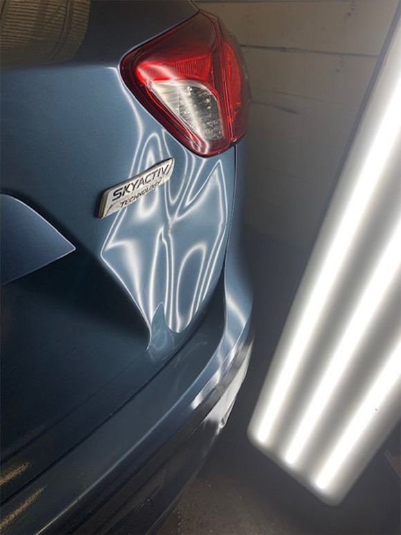 Dent at the back part of the car