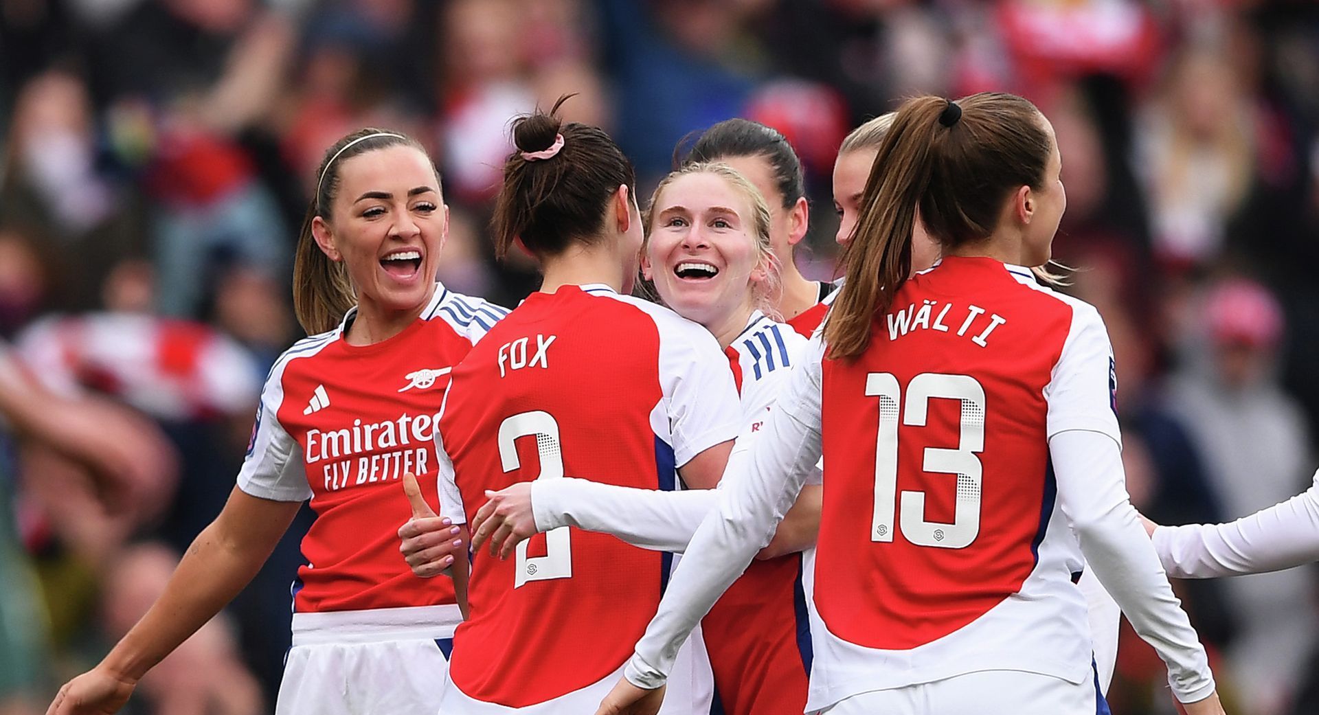 Arsenal women's team group hug