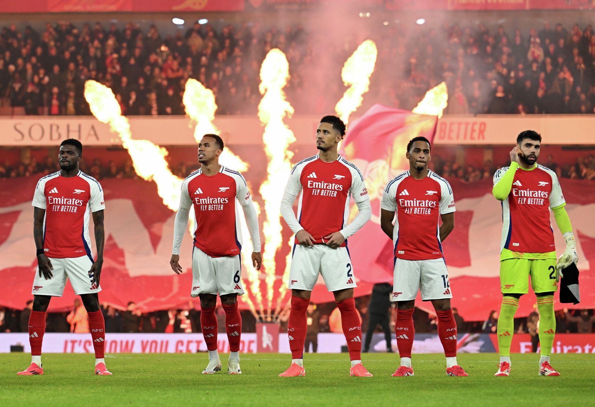 Arsenal men's team with fireworks