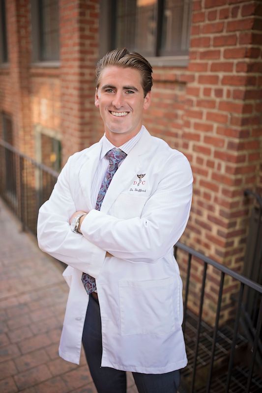 Dr. Stafford reviewing a patient's chart