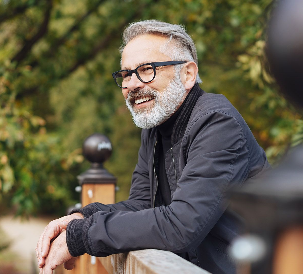 Man with full gray hair representing hair regeneration and hair loss treatment in Hollywood FL