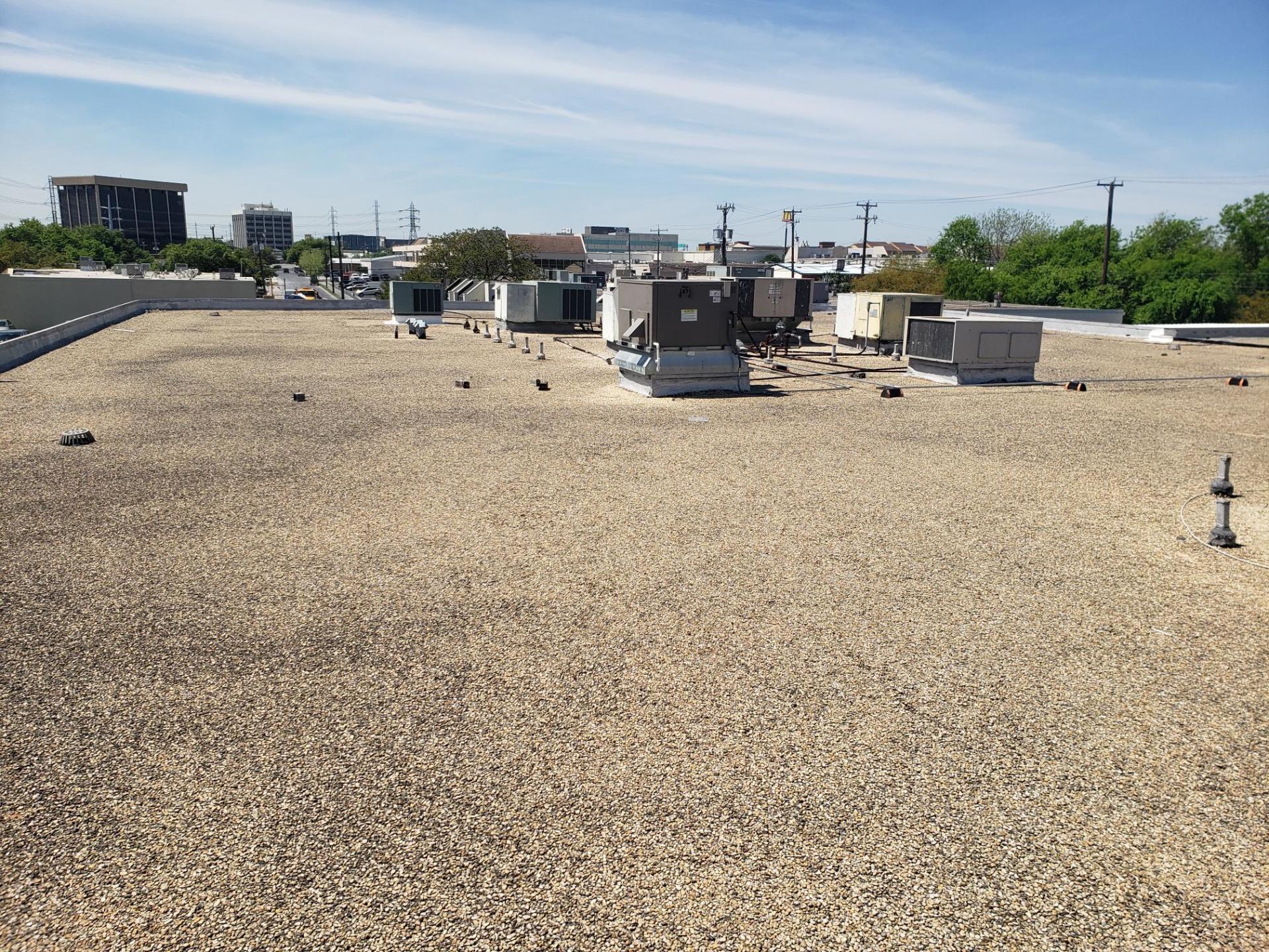 Gravel Roof on Big Building — San Antonio, TX — Alexander’s Roofing