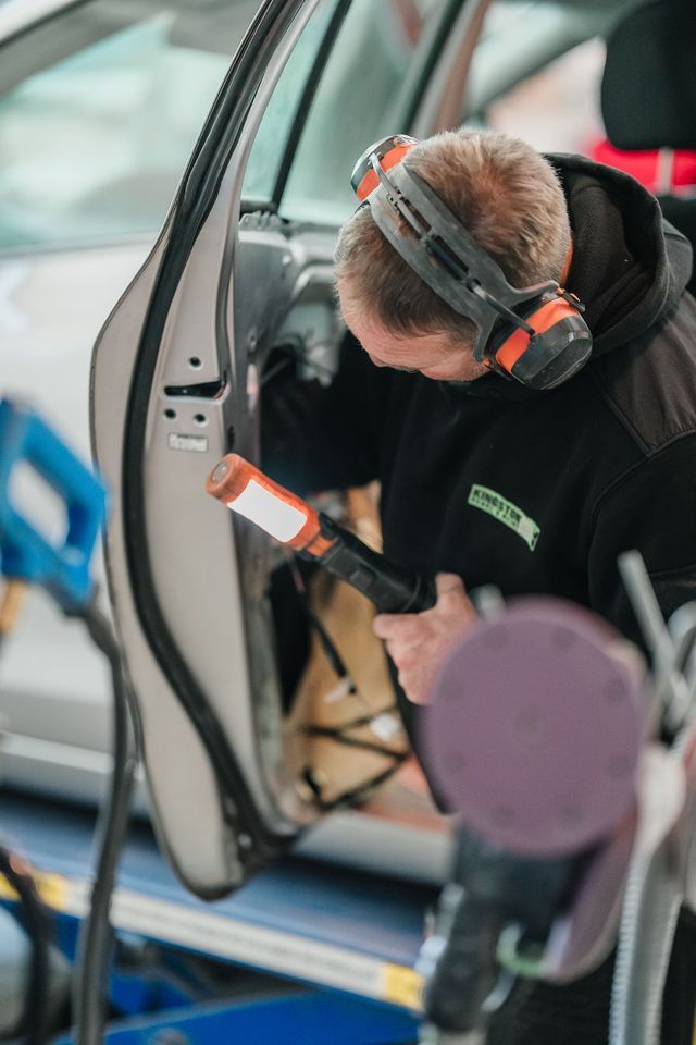 Mechanic Using a Diagnostic Tool Inside a Car — Kingston Panel & Paint in Huntingfield, TAS