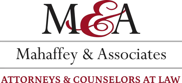 Logo for The Law Office of Bruce C. Betzer with a tree, water, heron, and sailboat over a ribbon banner