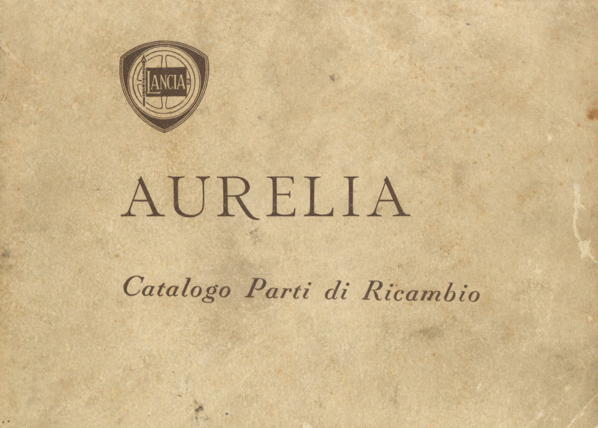 Cover of a Lancia Aurelia parts catalog. Beige background, Lancia logo, title 