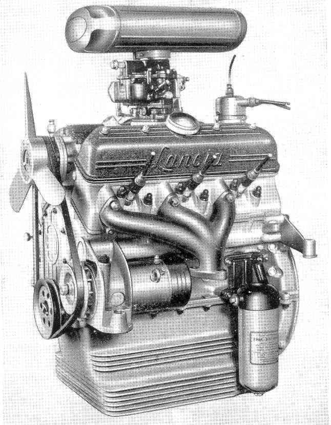 A black and white photo of a ford engine on a white background.