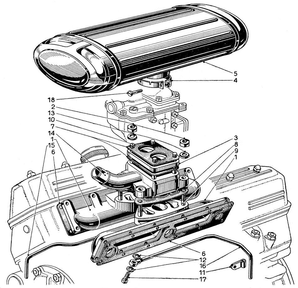 A black and white drawing of a carburetor on a car engine.