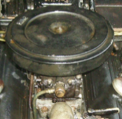 A close up of an air filter on a car engine