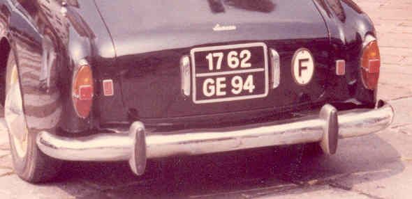 Back of a black vintage car with French license plate 