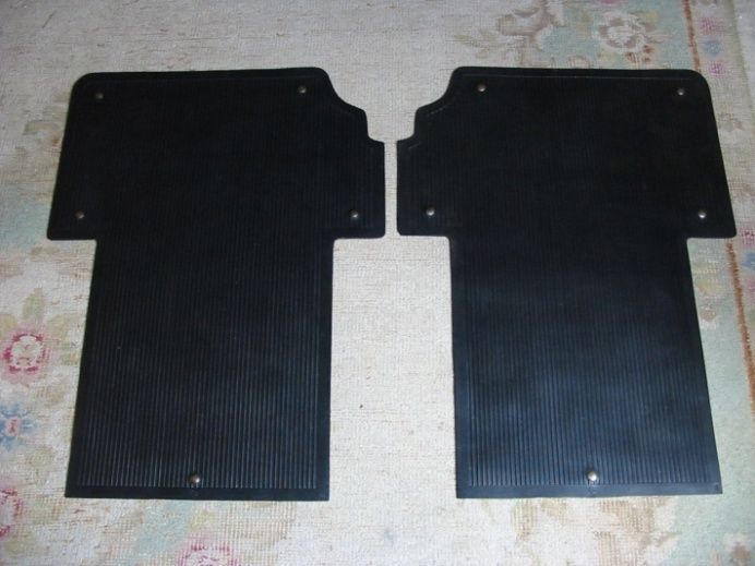 Pair of black rubber floor mats.