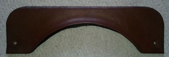 Brown, curved piece of leather with rounded edges, possibly a car part, on a beige surface.