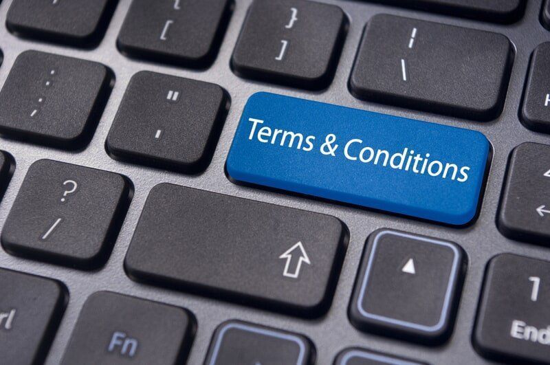 A Keyboard With A Blue Key That Says Terms And Conditions  — Surveillance NQ In Aitkenvale, QLD
