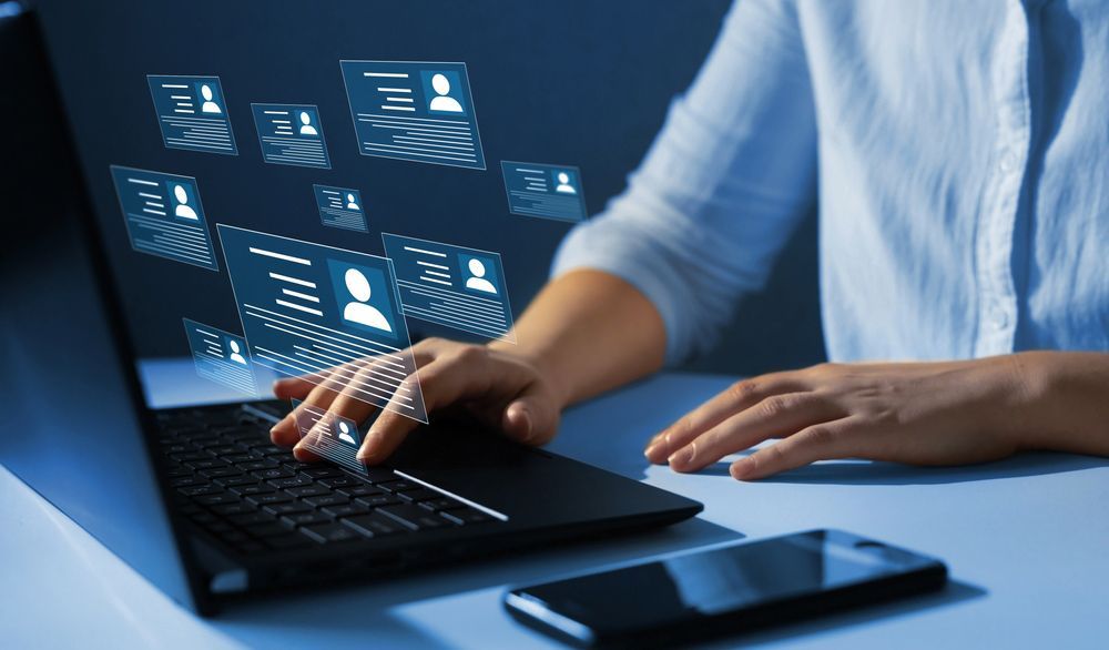 A Person Is Typing On A Laptop Computer — Surveillance NQ In Aitkenvale, QLD