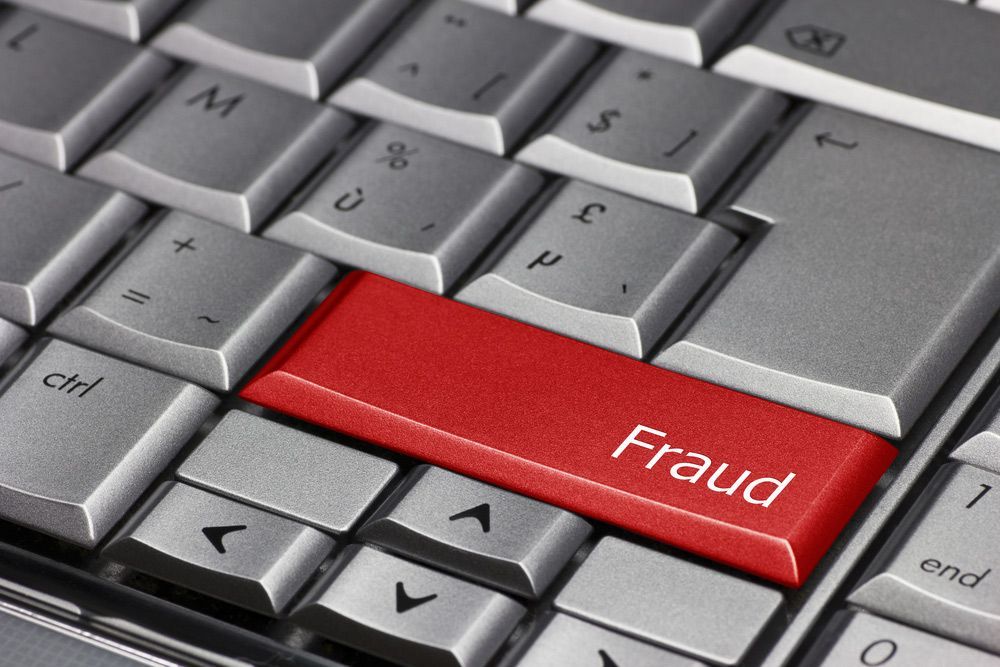 A Close Up Of A Keyboard With A Red Fraud Key  — Surveillance NQ In Cairns, QLD
