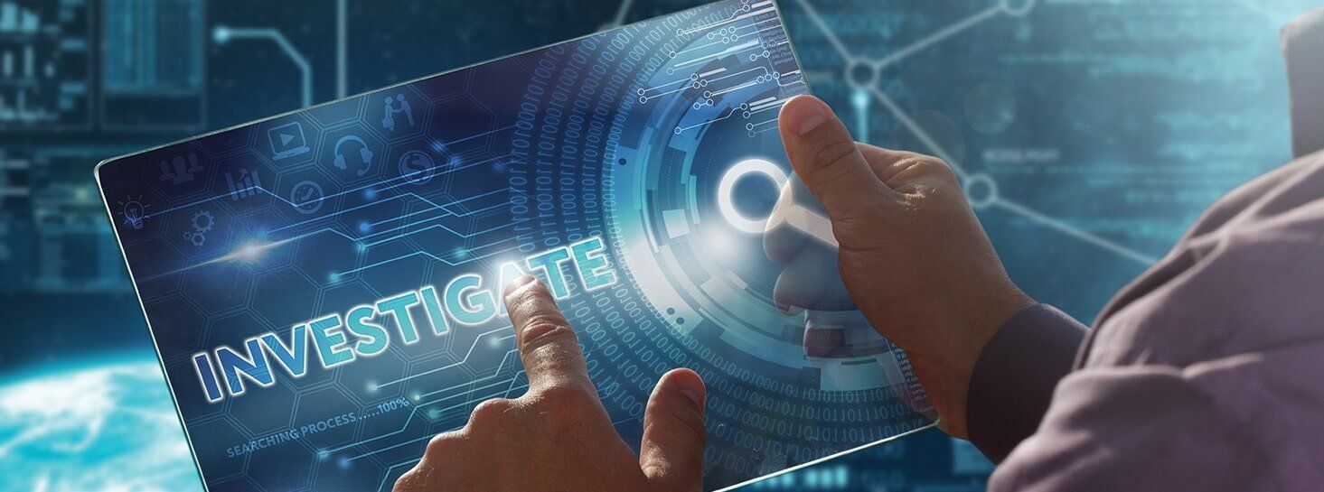 A Person Is Holding A Tablet With The Word Investigate On It — Surveillance NQ In Aitkenvale, QLD