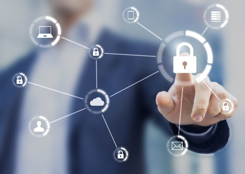 A Man In A Suit Is Pressing A Button With A Padlock On It — Surveillance NQ In Aitkenvale, QLD