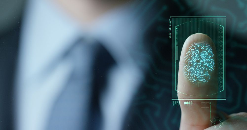 A Man Is Pressing A Button On A Screen With His Finger  — Surveillance NQ In Cairns, QLD
