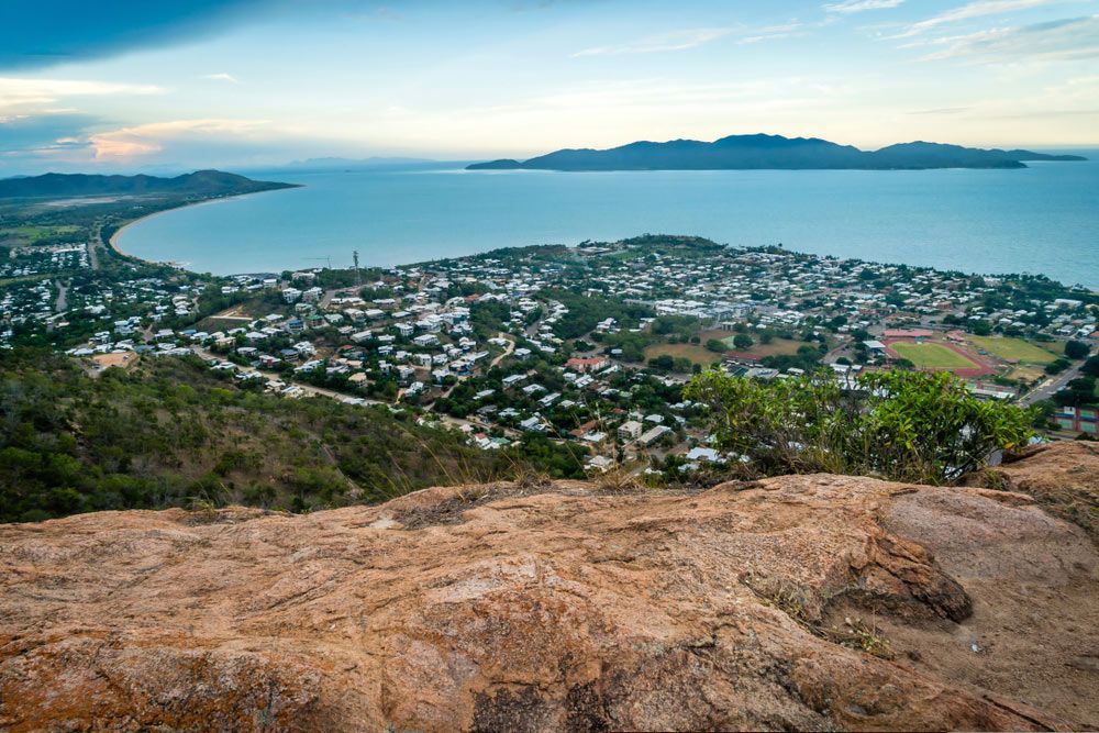 A View Of A City From A Rocky Cliff Overlooking The Ocean — Surveillance NQ In Townsville, QLD