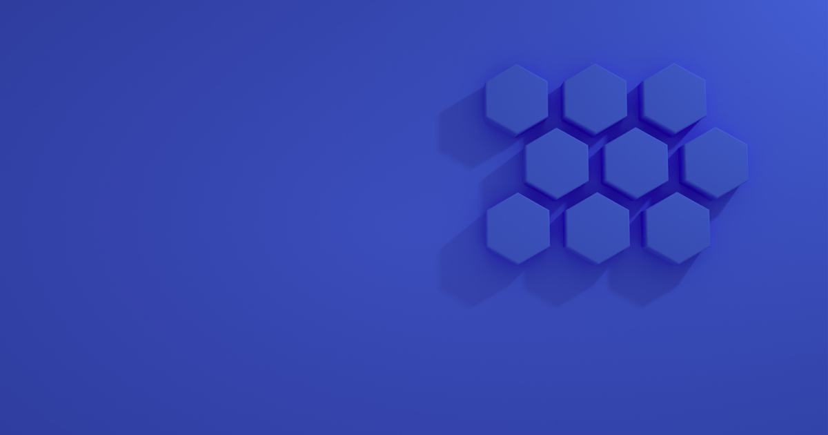 Blue abstract background with a cluster of raised hexagonal tiles in the upper right