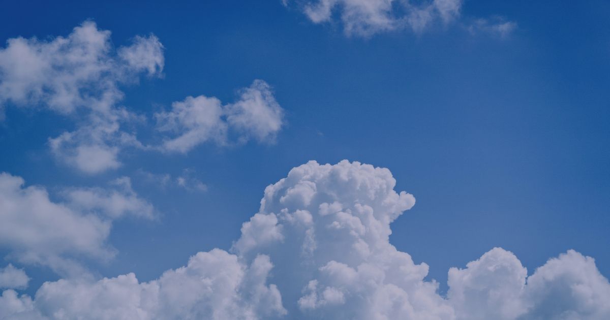 Blue sky with fluffy white clouds