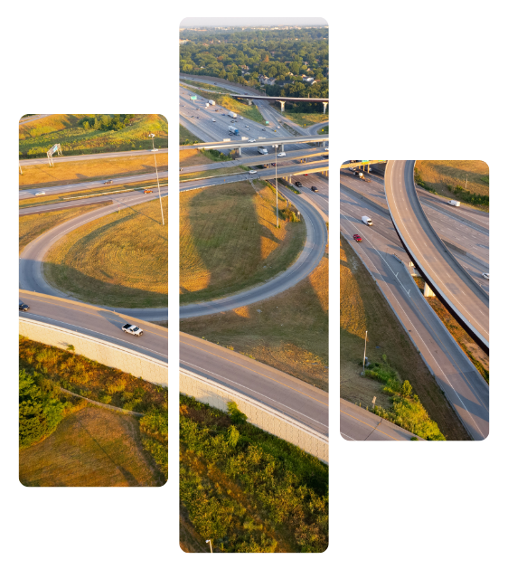 Aerial view of a multi-level highway interchange with looping ramps and moving cars in golden light