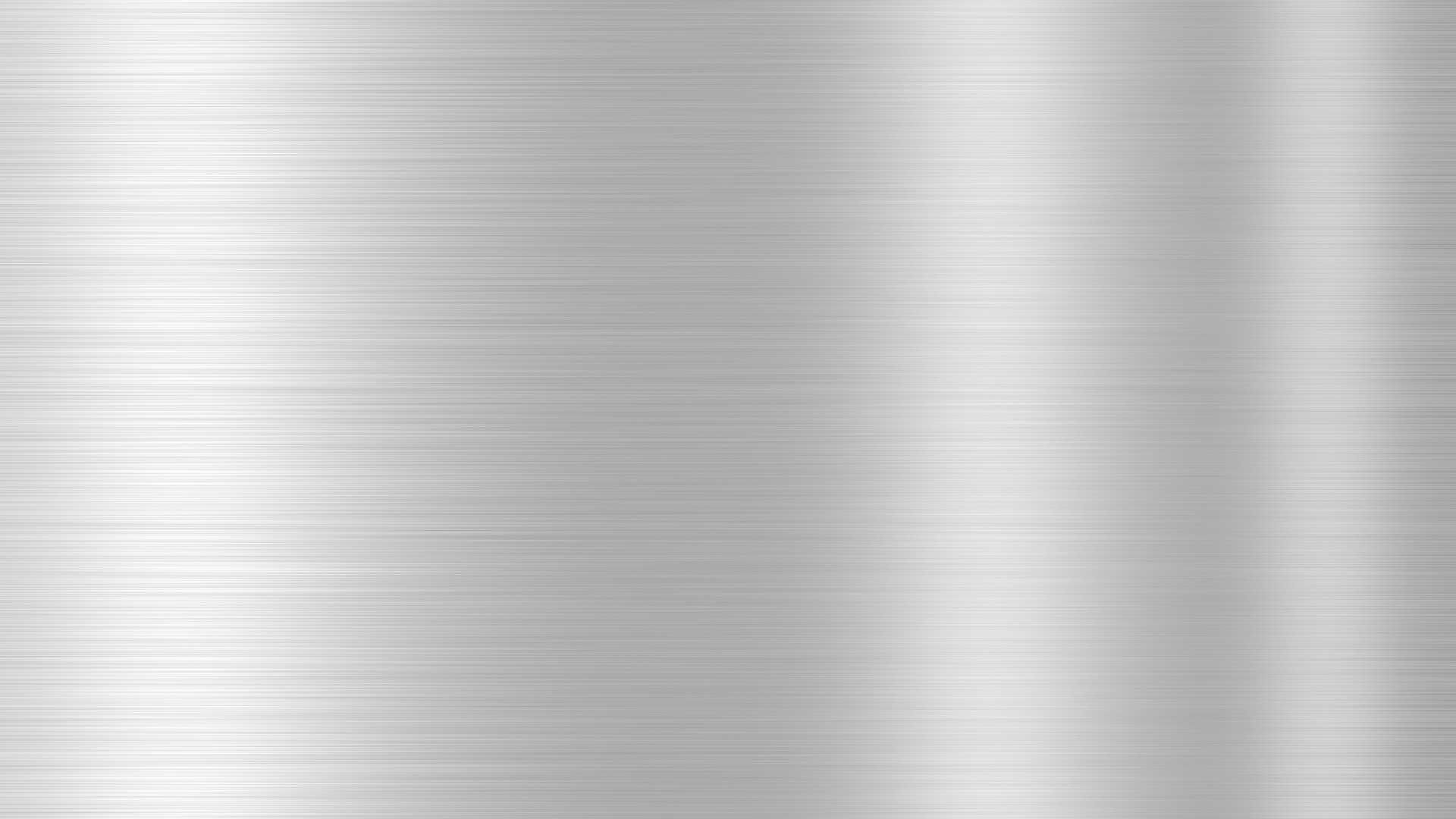 A close up of a brushed stainless steel texture.