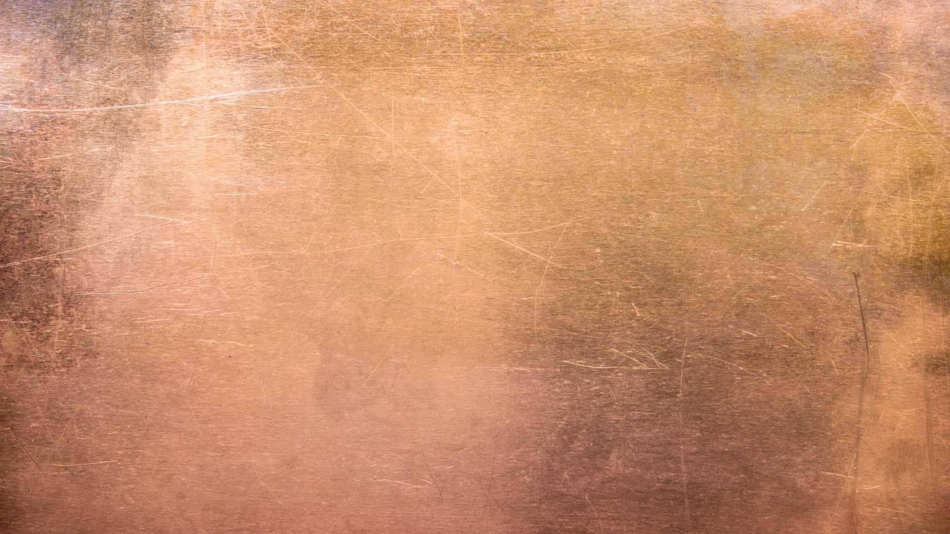 A close up of a copper foil texture.