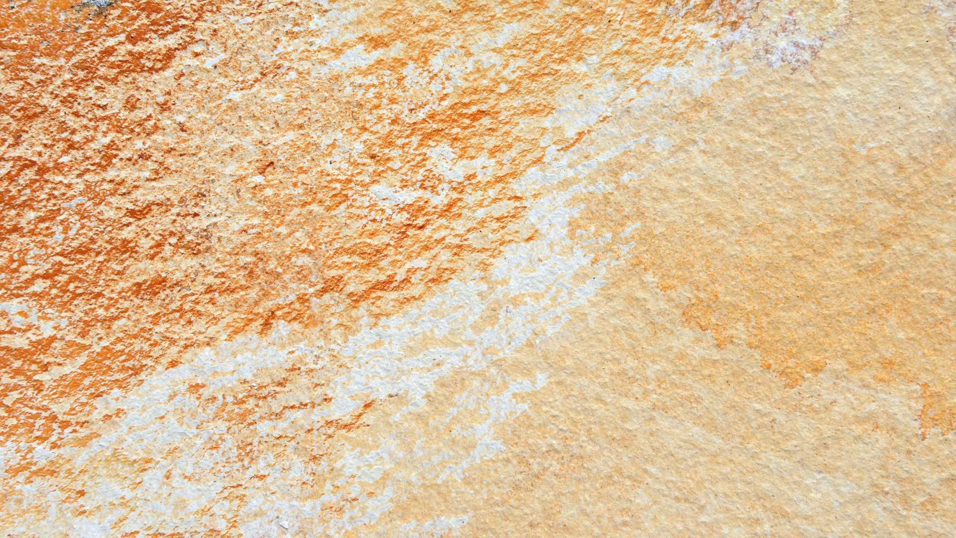 A close up of a rusty metal surface.