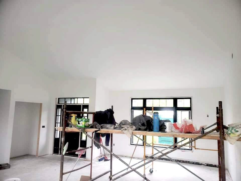 New drywall installed in modern home in Prince Edward County