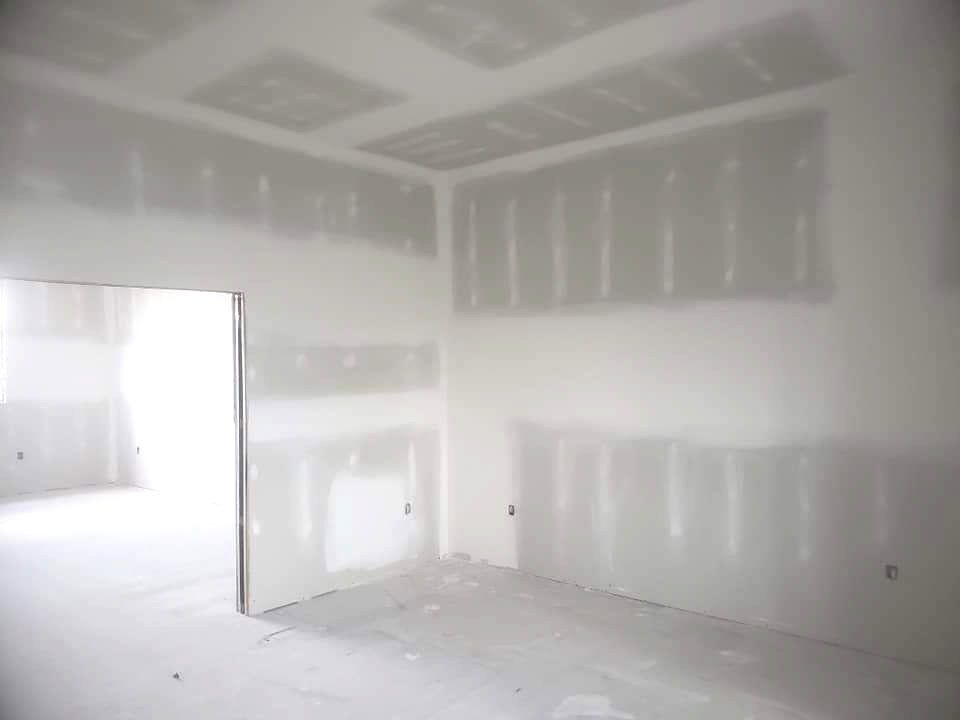 Pictured is a mudding and taping project that we completed