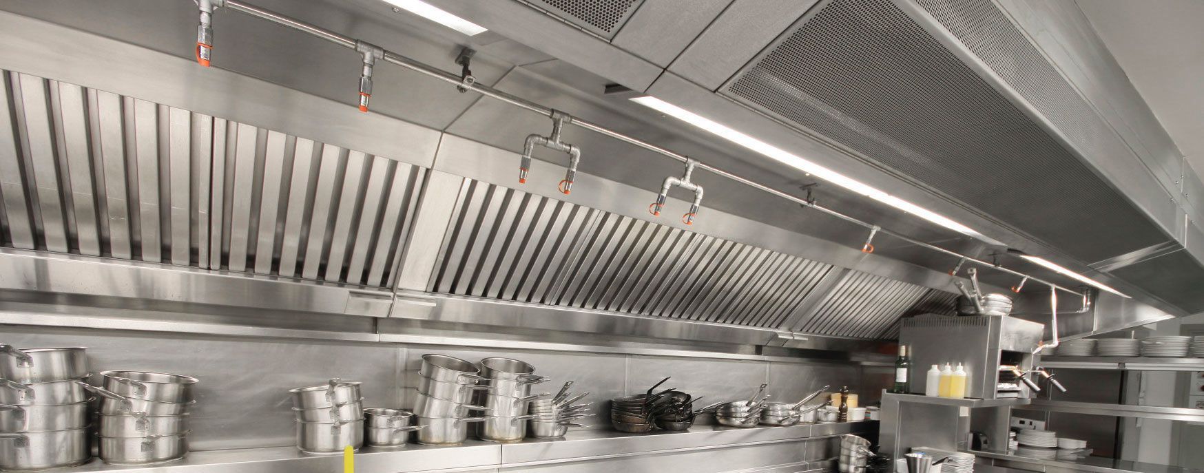A close up of a stainless steel wall in an elevator.