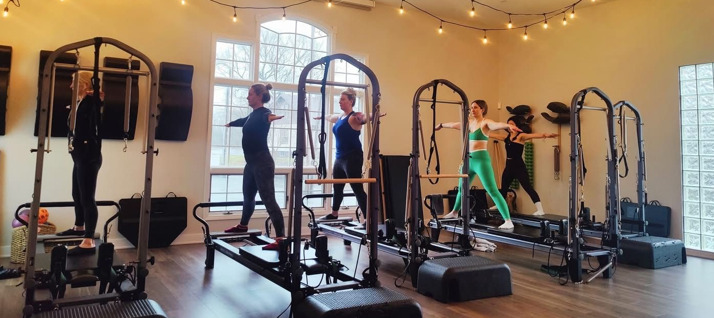 pilates reformer class at rise integrative therapy and pilates