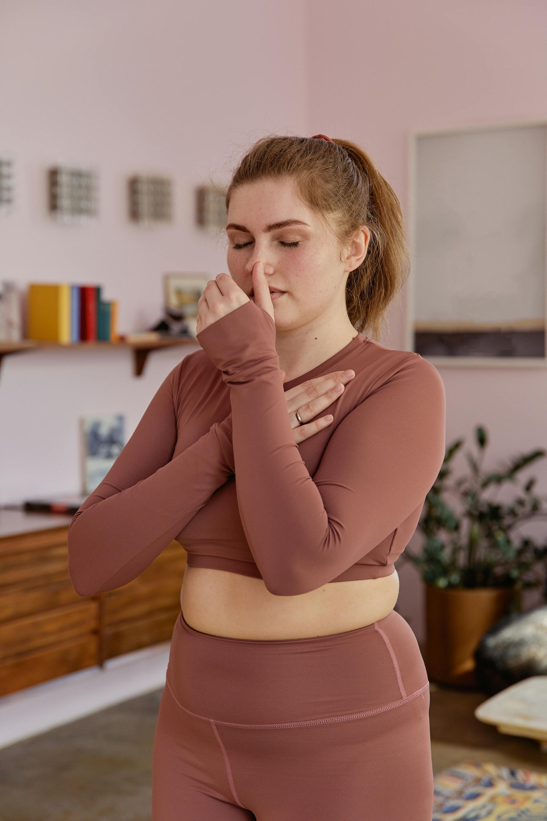 woman focusing on Breathing and Breathwork in Pilates, Meditation, and Yoga