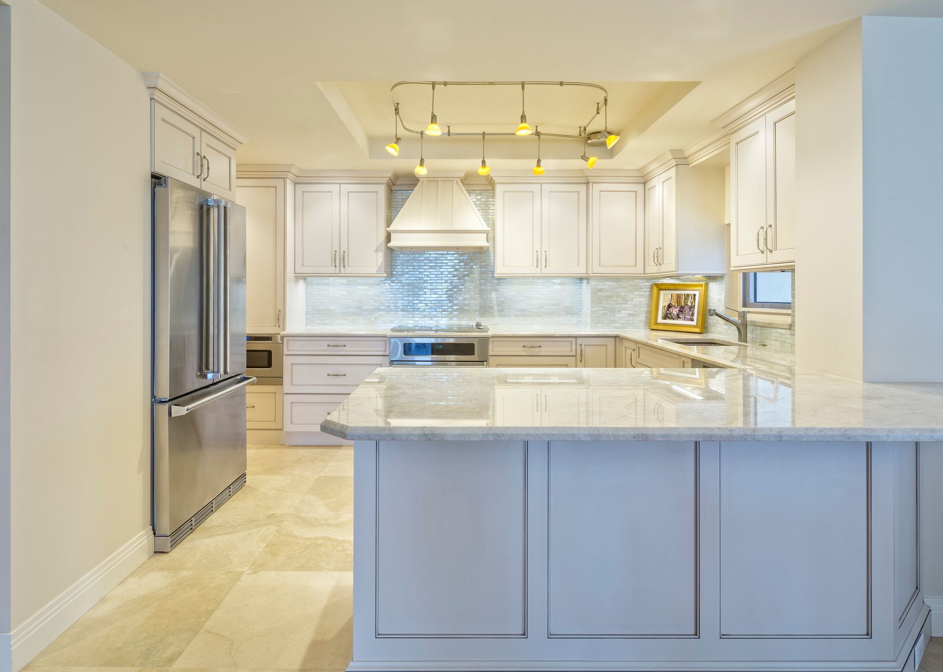 A Kitchen with White Cabinets