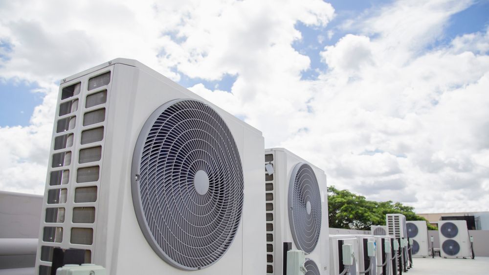 White Hvac Units on a Roof — Allchin Airconditioning & Refrigeration Electrical in Caloundra, QLD